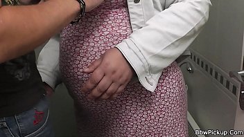 Busty woman rides cock in restroom